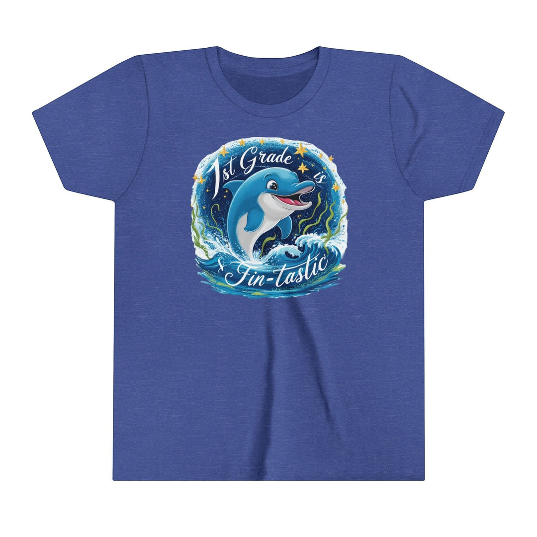 Sea Dragon Dreams blue youth short sleeve tee with a 1st Grade Fintastic dolphin graphic and ocean wave design.