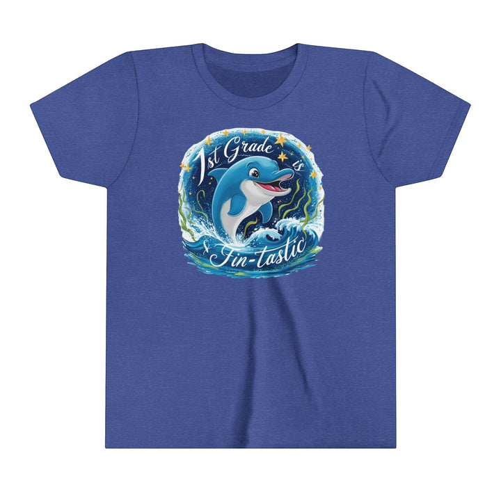 Sea Dragon Dreams blue youth short sleeve tee with a 1st Grade Fintastic dolphin graphic and ocean wave design.