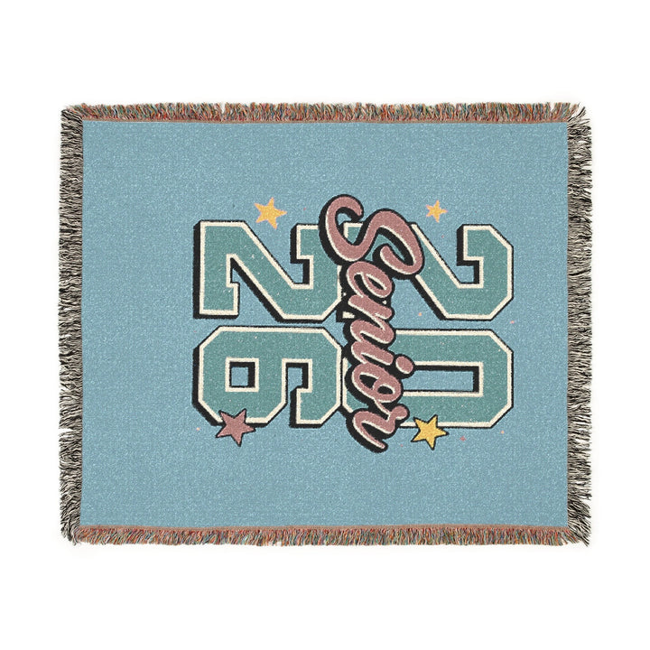 Sea Dragon Dreams 2026 senior woven cotton throw blanket in light blue with colorful fringed edges and star accents.