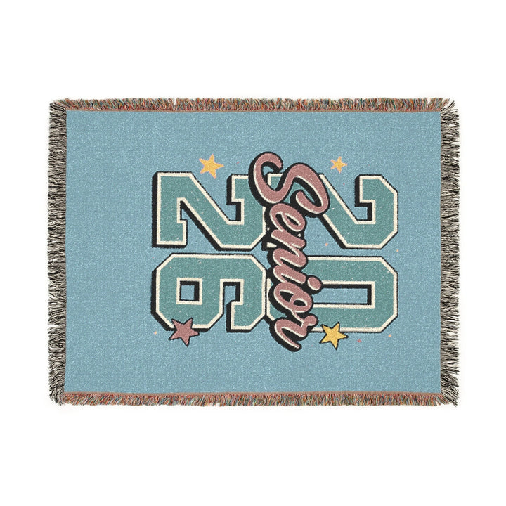 Sea Dragon Dreams 2026 senior woven cotton throw blanket in blue with fringed edges and star accents.