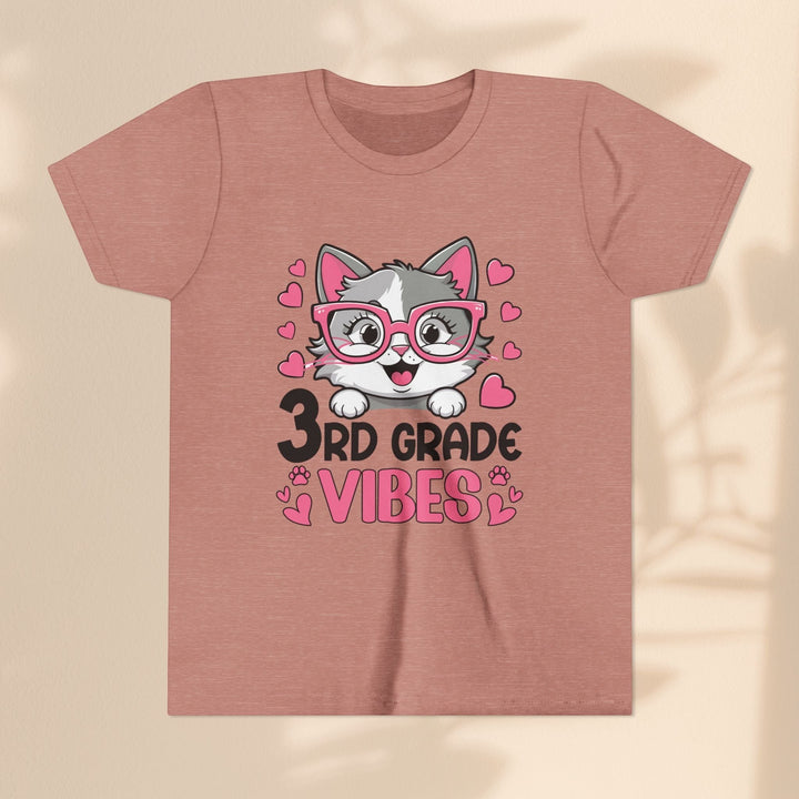 Sea Dragon Dreams youth t-shirt in dusty pink featuring a cute cat wearing pink glasses and 3rd Grade Vibes graphic.