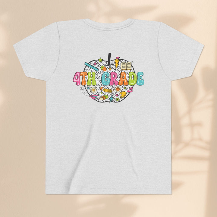 Sea Dragon Dreams 4th Grade youth t-shirt in heather grey cotton with a colorful apple graphic and school supplies.