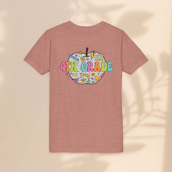 Sea Dragon Dreams 4th grade youth t-shirt in mauve with a colorful apple graphic featuring school supplies.