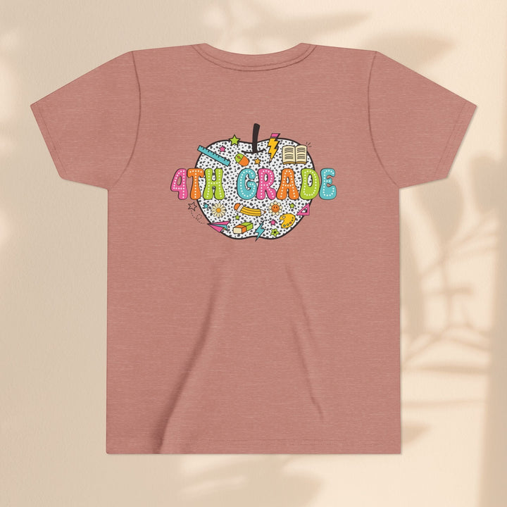 Sea Dragon Dreams 4th Grade youth t-shirt in dusty rose cotton with a colorful apple school supplies graphic on back