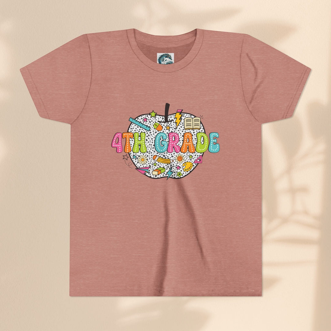 Sea Dragon Dreams 4th Grade youth t-shirt in dusty rose cotton with a colorful apple graphic and school supplies.
