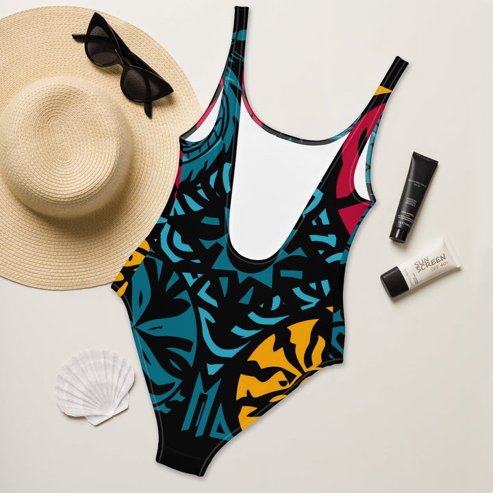 Sea Dragon Dreams one-piece swimsuit featuring a vibrant abstract pattern, scoop neckline, and low scoop back.