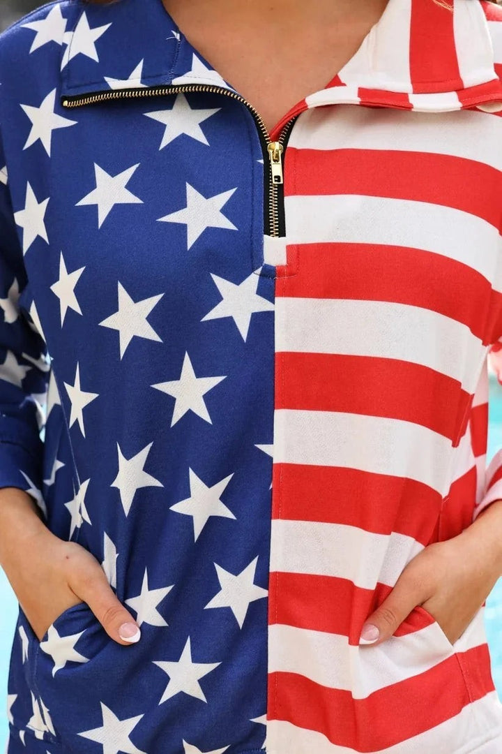 Sea Dragon Dreams patriotic quarter-zip pullover with American flag print, gold zipper, and side pockets.