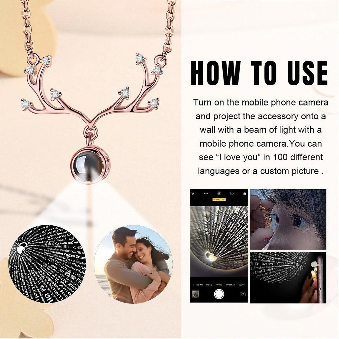 Sea Dragon Dreams rose gold antler projection necklace with custom photo and hidden I Love You message feature