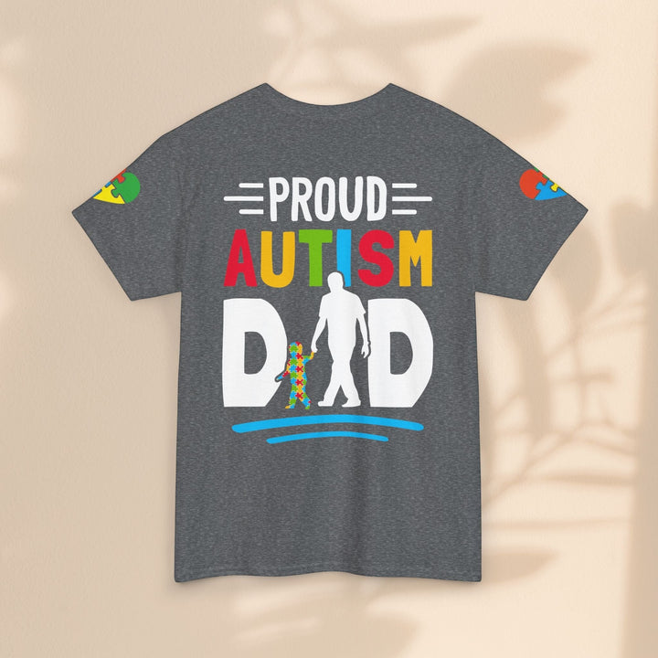 Sea Dragon Dreams grey heavy cotton t-shirt featuring a colorful Proud Autism Dad graphic with puzzle piece accents.