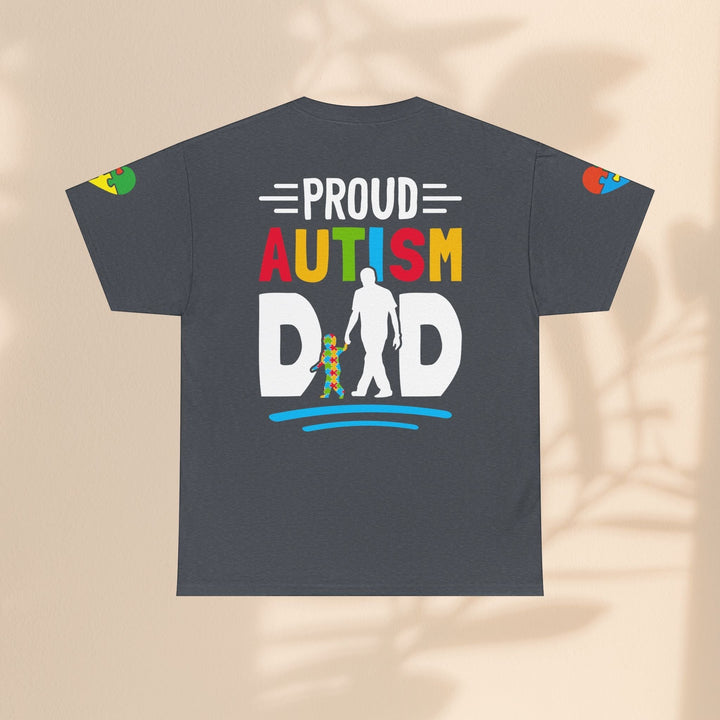 Sea Dragon Dreams unisex heavy cotton t-shirt in dark grey with a colorful Proud Autism Dad graphic on the back.