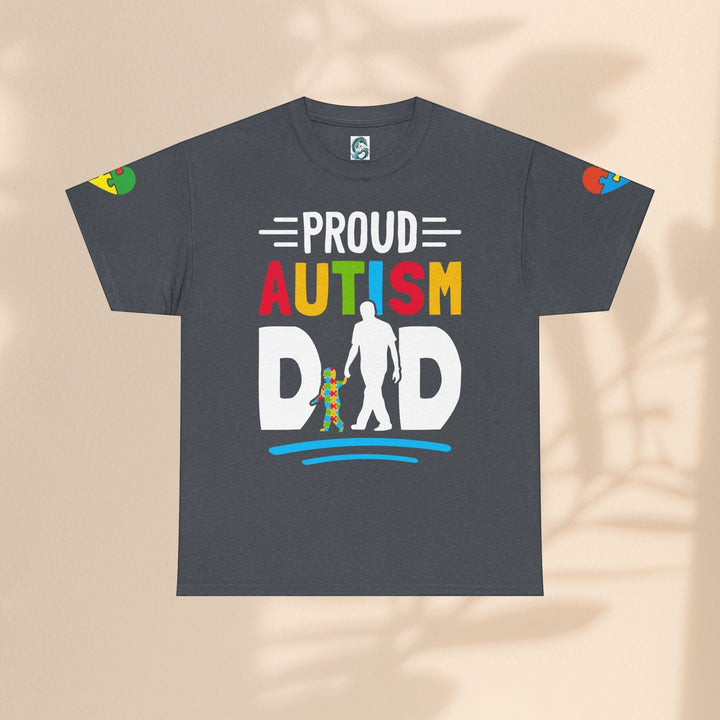 Sea Dragon Dreams heavy cotton t-shirt in dark grey with a colorful Proud Autism Dad graphic and puzzle piece details.