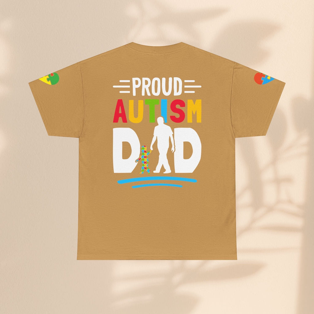 Sea Dragon Dreams Proud Autism Dad heavy cotton t-shirt in tan with a colorful graphic print on the back.