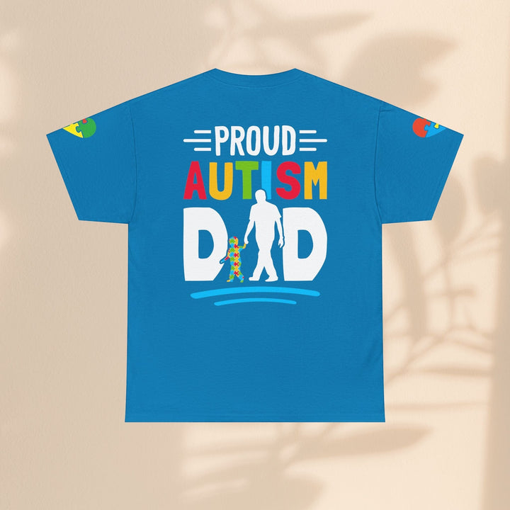 Sea Dragon Dreams blue heavy cotton t-shirt with Proud Autism Dad graphic on the back and puzzle piece sleeve detail.