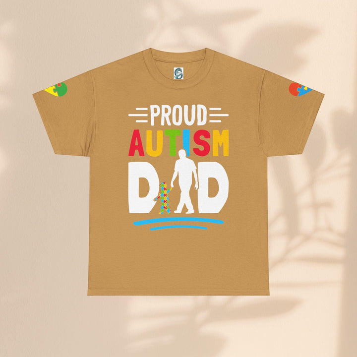 Sea Dragon Dreams tan heavy cotton t-shirt featuring a colorful Proud Autism Dad graphic and puzzle piece accents.