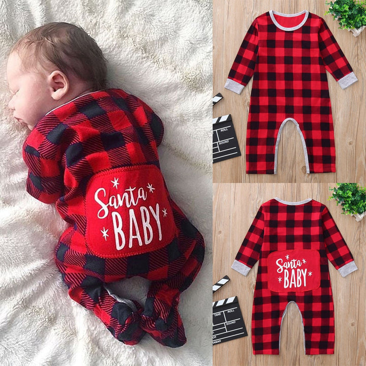 Sea Dragon Dreams baby Santa plaid romper with Santa Baby text on the back, worn by a sleeping infant.