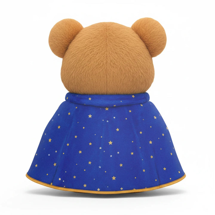 Sea Dragon Dreams Brave Buddies bear pillow showing the back view of a plush brown bear wearing a blue starry cape.
