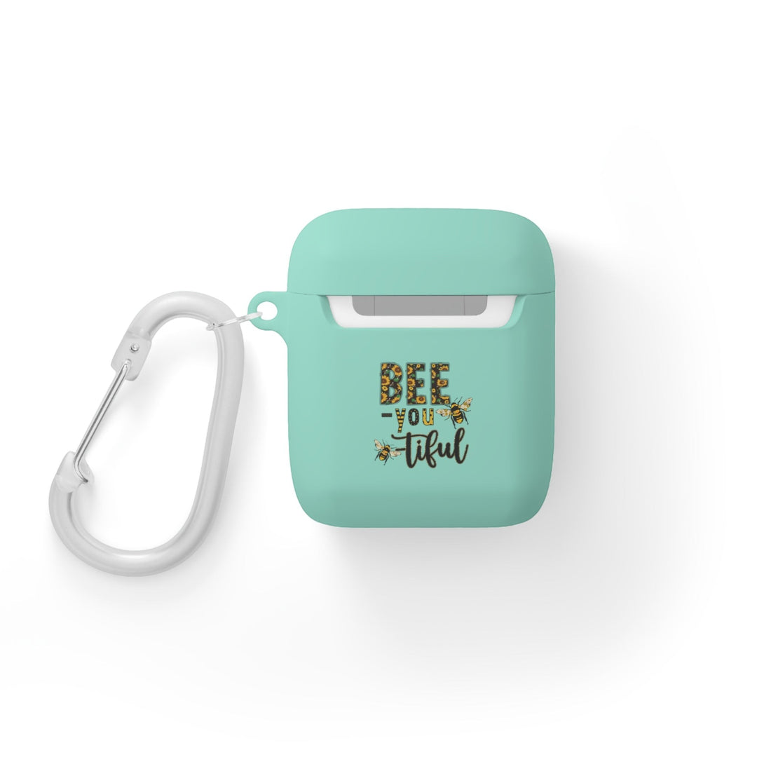 Sea Dragon Dreams mint green TPU AirPods case with Bee-You-Tiful floral bee design and white metal carabiner.