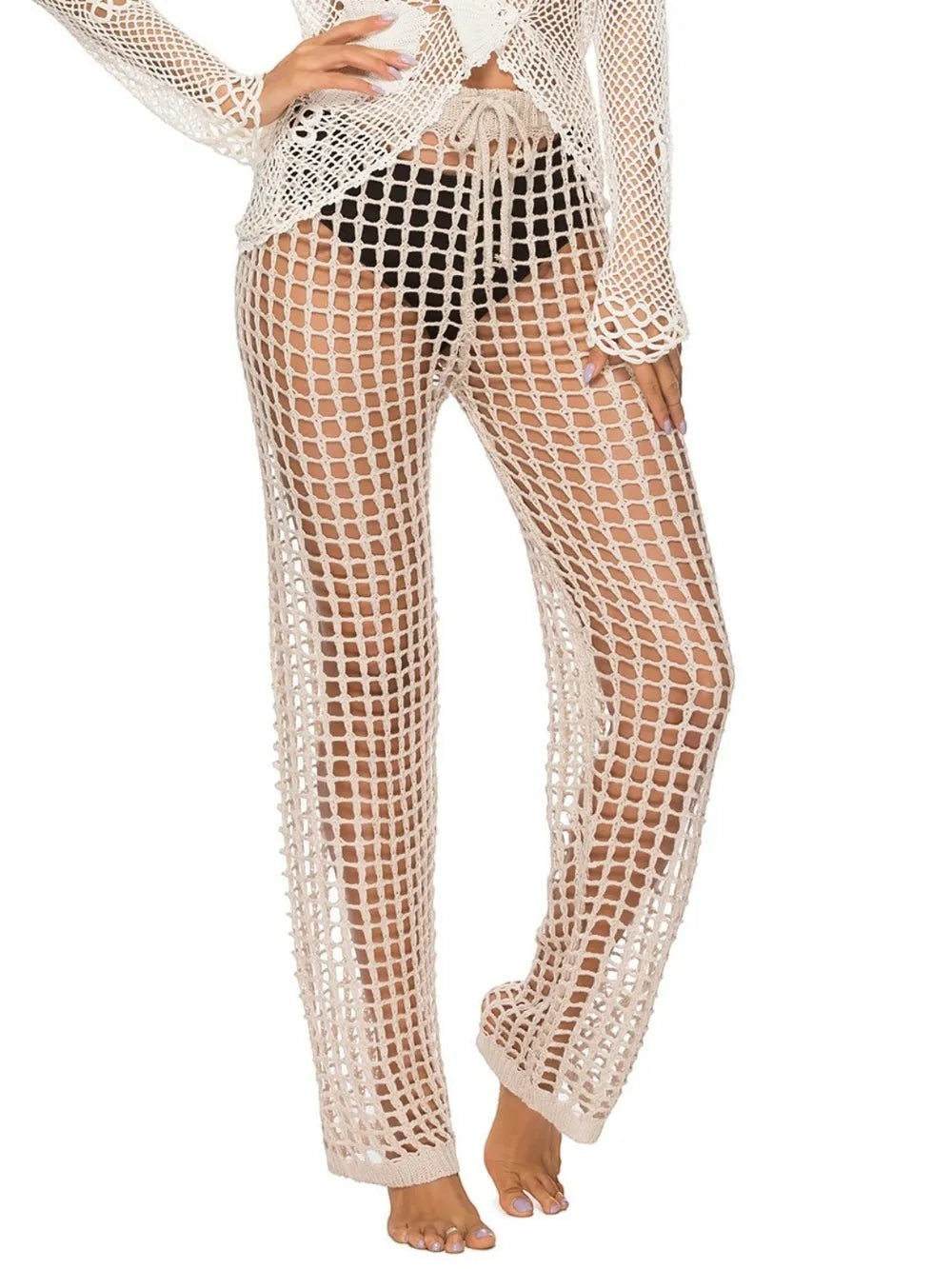 Sea Dragon Dreams high waist beige crochet swim pants with cutout mesh design worn over black bikini bottoms