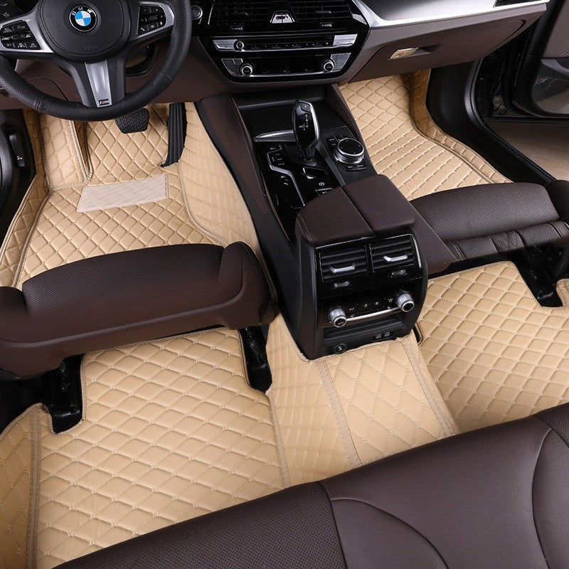 Sea Dragon Dreams beige TPE and XPE car floor mats with diamond-stitched pattern installed in a 5-seat vehicle interior.