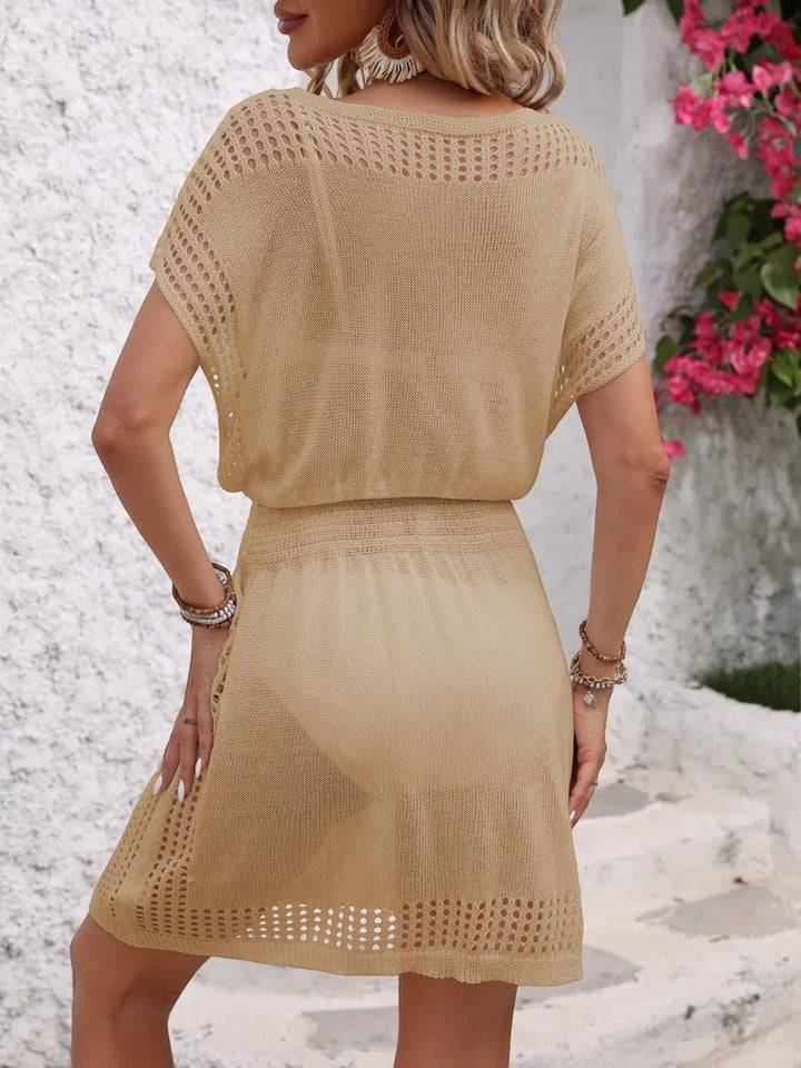 Sea Dragon Dreams beige openwork short sleeve cover-up dress seen from the back, featuring a relaxed fit.