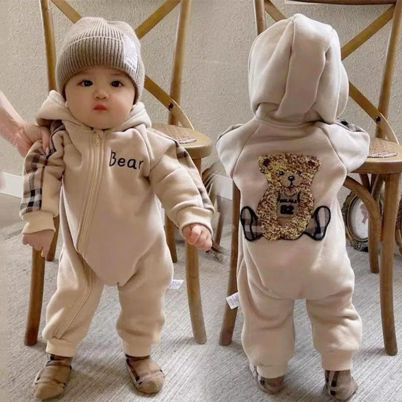 Sea Dragon Dreams baby onesie in beige with a teddy bear back design, front zipper, and plaid sleeve accents.