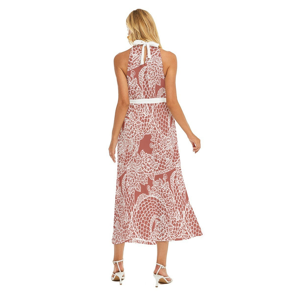 Sea Dragon Dreams belted halter dress in dusty rose with white dragon print, featuring a wrap hem and back view