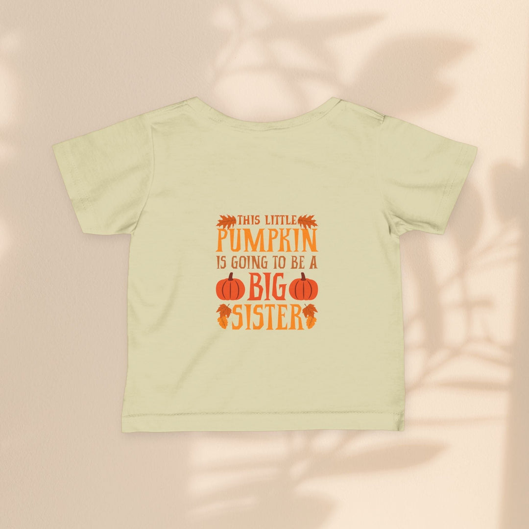 Sea Dragon Dreams infant tee in light yellow with Big Sister Pumpkin graphic print for fall announcement.