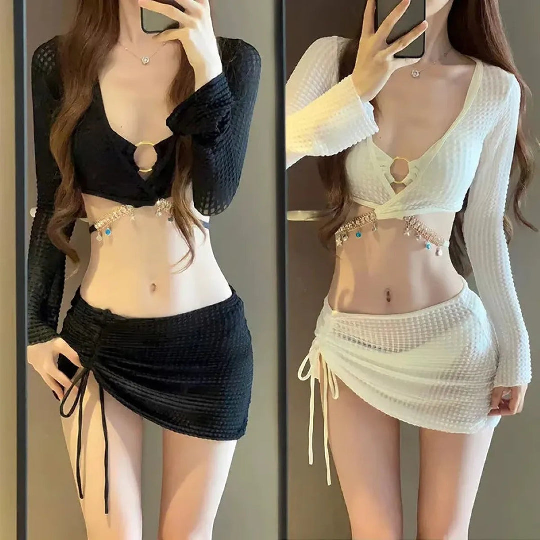 Sea Dragon Dreams 4-piece bikini set with drawstring skirt, long sleeves, and diamond chain trim in black and white.