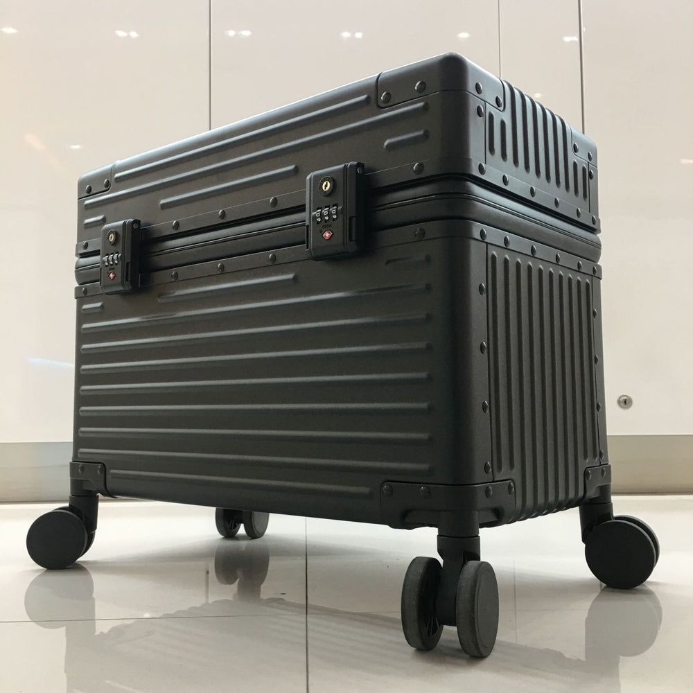 Sea Dragon Dreams black all-aluminum photography trolley case with a rigid ribbed exterior and secure combination locks