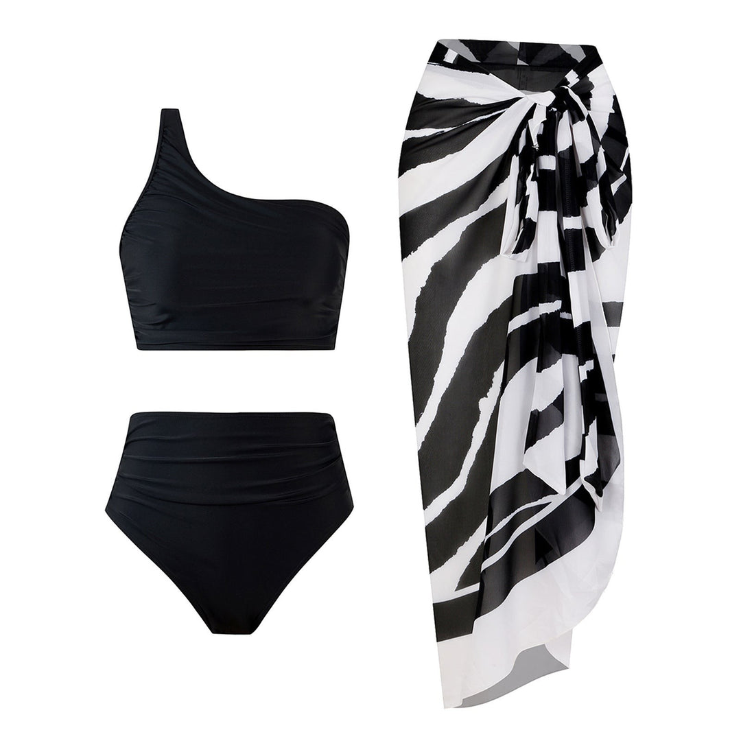 Sea Dragon Dreams black one-shoulder bikini set with high-waisted bottoms and a zebra print sarong wrap