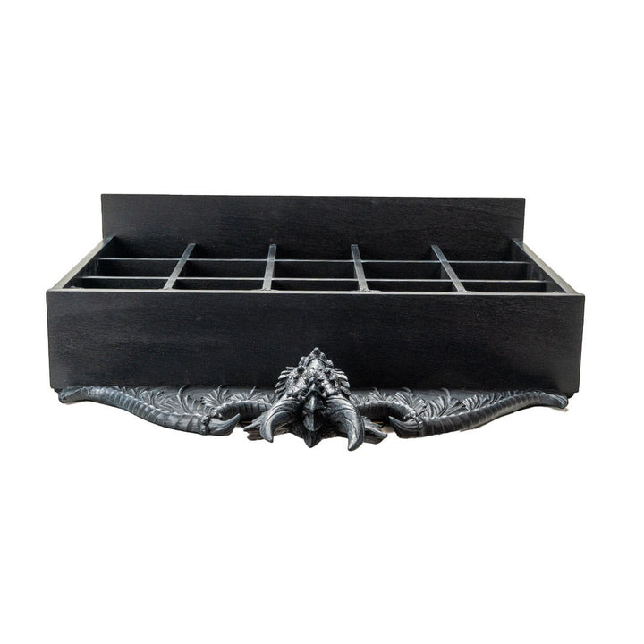 Sea Dragon Dreams black resin wall shelf featuring a detailed dragon head and wings for fantasy home decor