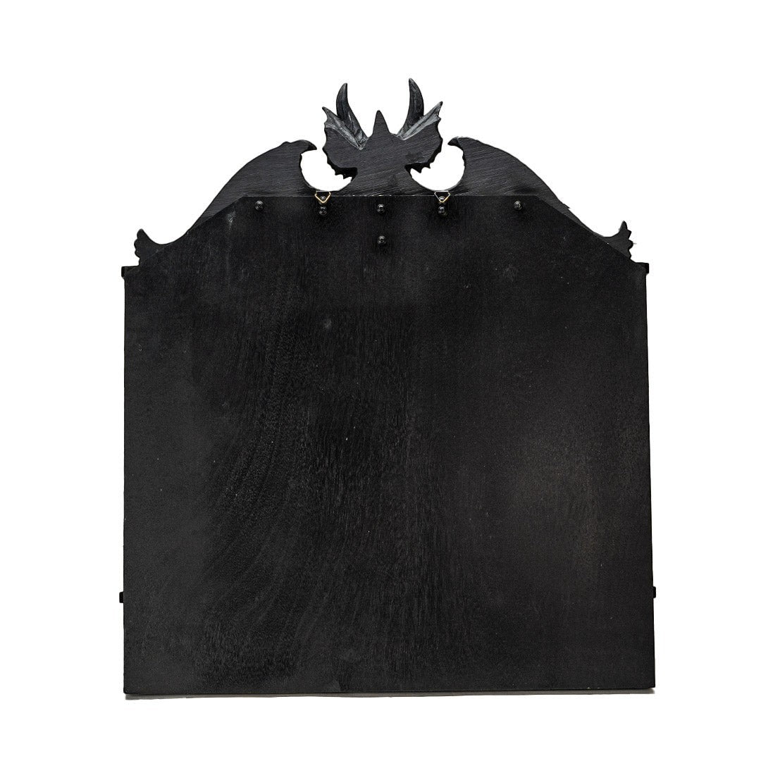 Sea Dragon Dreams black resin wall shelf featuring a detailed dragon silhouette with wings and scales