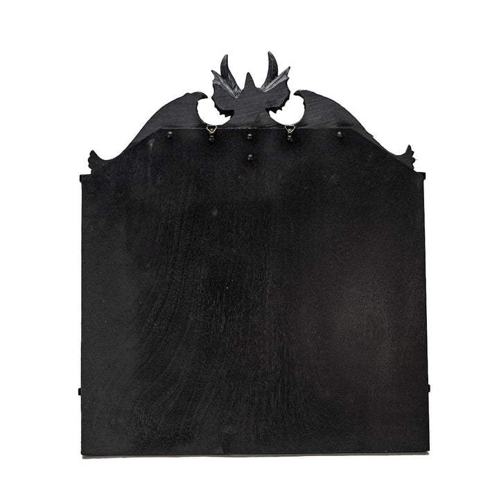 Sea Dragon Dreams black resin wall shelf featuring a detailed dragon silhouette with wings and scales
