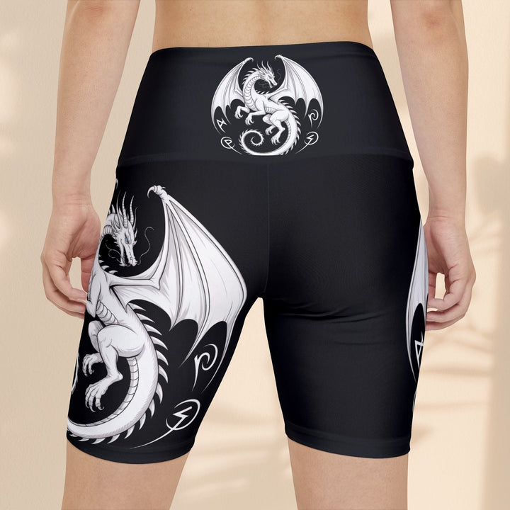 Sea Dragon Dreams women's black athletic workout shorts featuring a white fantasy dragon print and gusset insert.