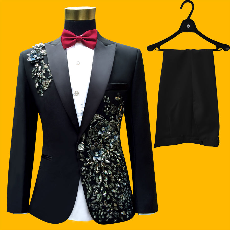 Sea Dragon Dreams black slim-fit tuxedo suit with blue floral paillette embroidery, including blazer and trousers.