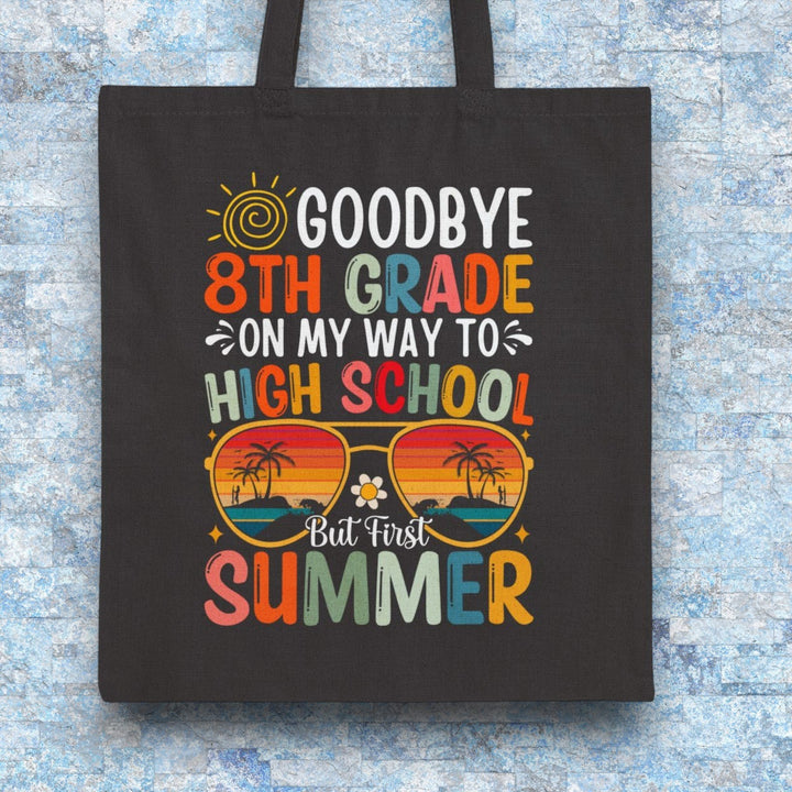 Sea Dragon Dreams black cotton canvas tote bag with colorful 8th grade graduation and summer beach graphic print