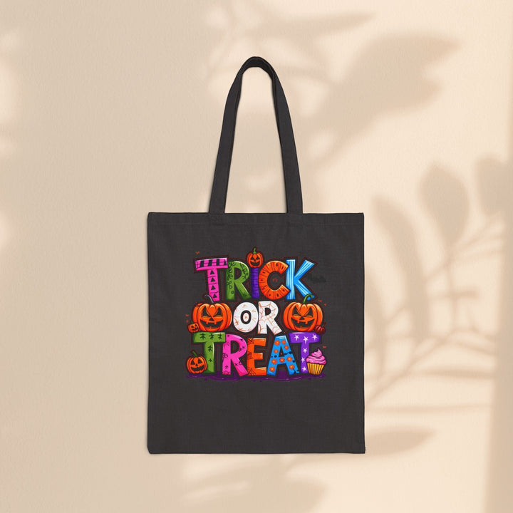 Sea Dragon Dreams black cotton canvas tote bag with colorful Trick or Treat Halloween graphic print