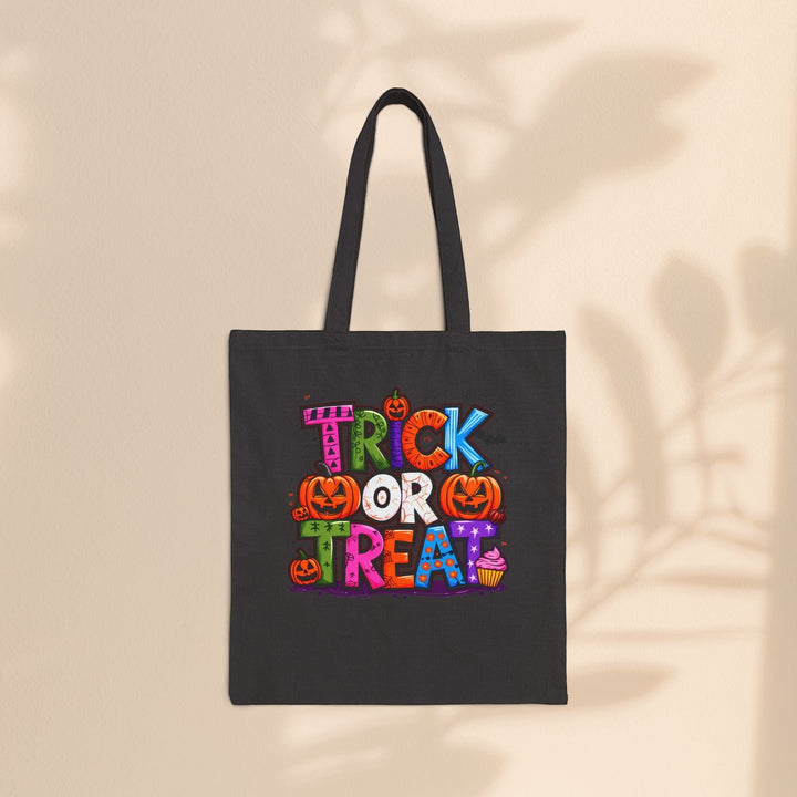 Sea Dragon Dreams black cotton canvas tote bag with colorful Trick or Treat Halloween graphic print