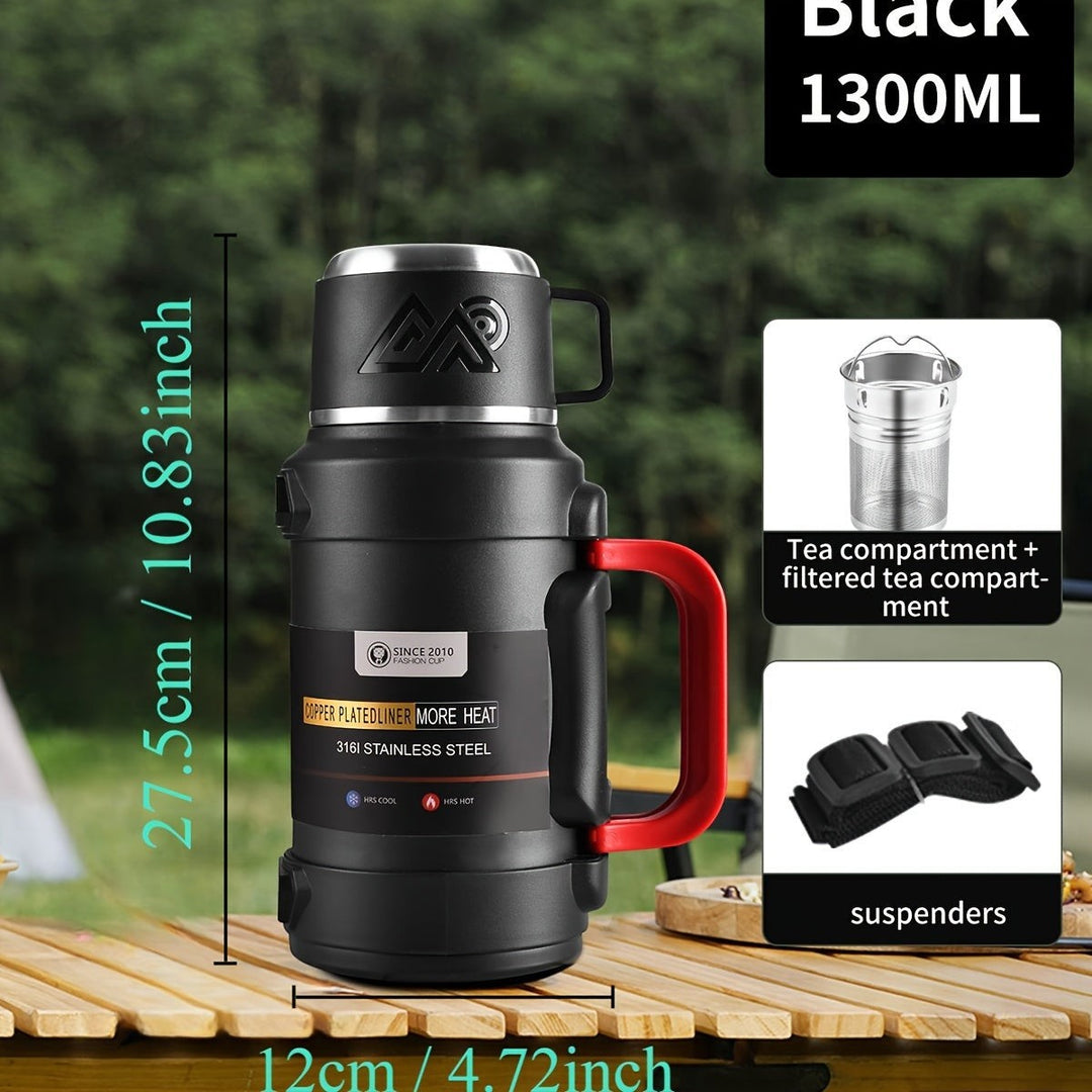 Sea Dragon Dreams black stainless steel insulated water bottle with handle, tea filter, and carrying strap.