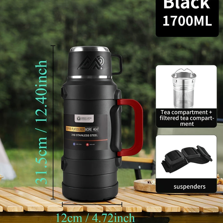 Sea Dragon Dreams black stainless steel insulated water bottle with handle, tea filter, and carry strap.