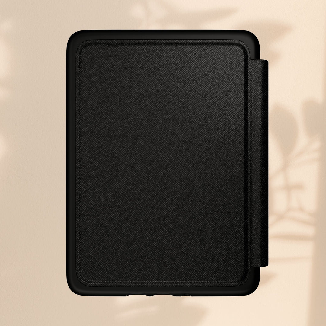 Sea Dragon Dreams black textured PU leather Kindle case with a magnetic closure and protective design.