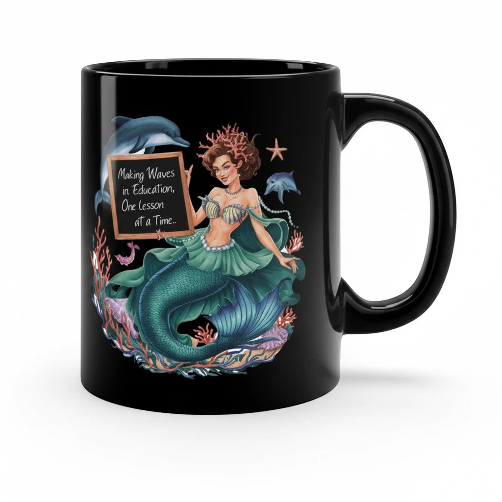 Sea Dragon Dreams black ceramic 11oz coffee mug featuring a mermaid teacher illustration with dolphins and coral.