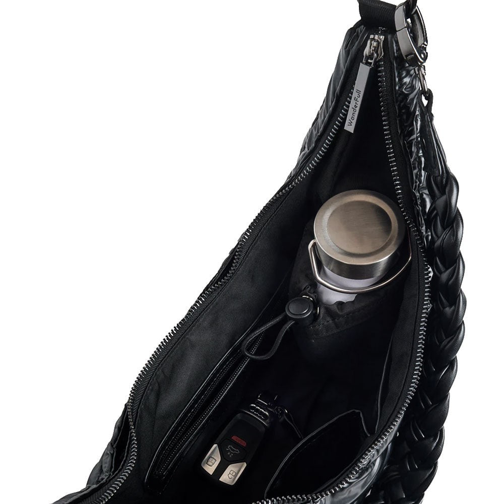 Sea Dragon Dreams Black Pearl HydroHobo bag interior with stainless steel water bottle and organized pockets