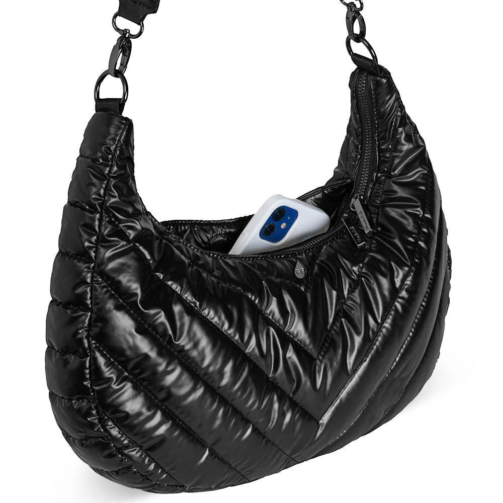 Sea Dragon Dreams black nylon half-moon HydroHobo crossbody bag with gunmetal hardware and phone in outer pocket