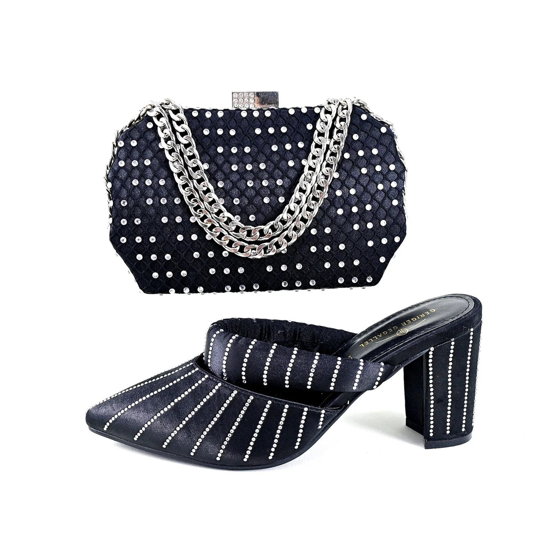 Sea Dragon Dreams black satin high-heeled mules and matching clutch bag with silver rhinestone embellishments.