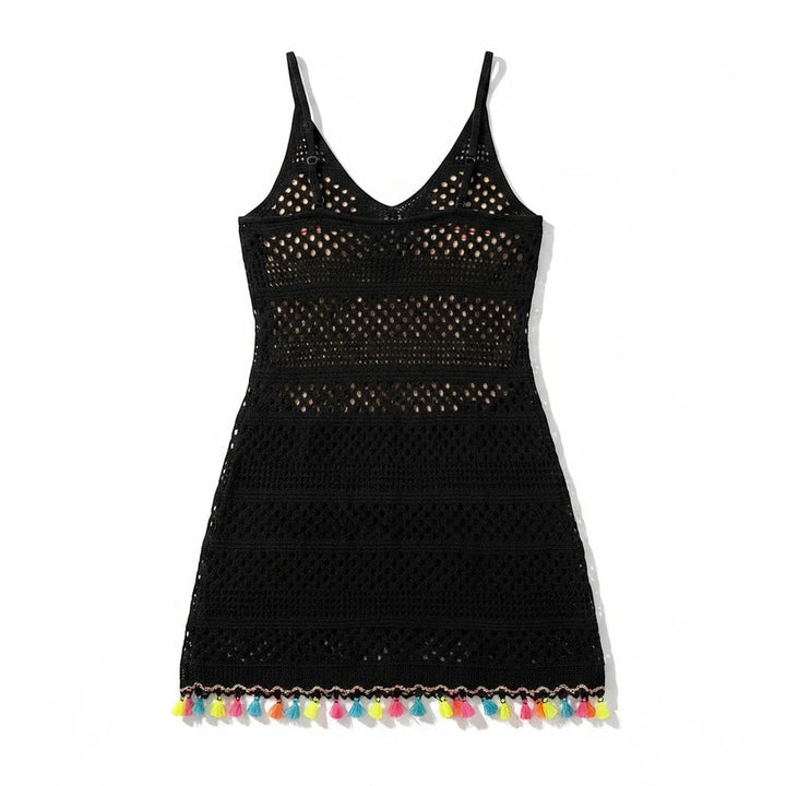 Sea Dragon Dreams black woven beach cover-up dress with hollow-out knit details and colorful tassel hem trim.