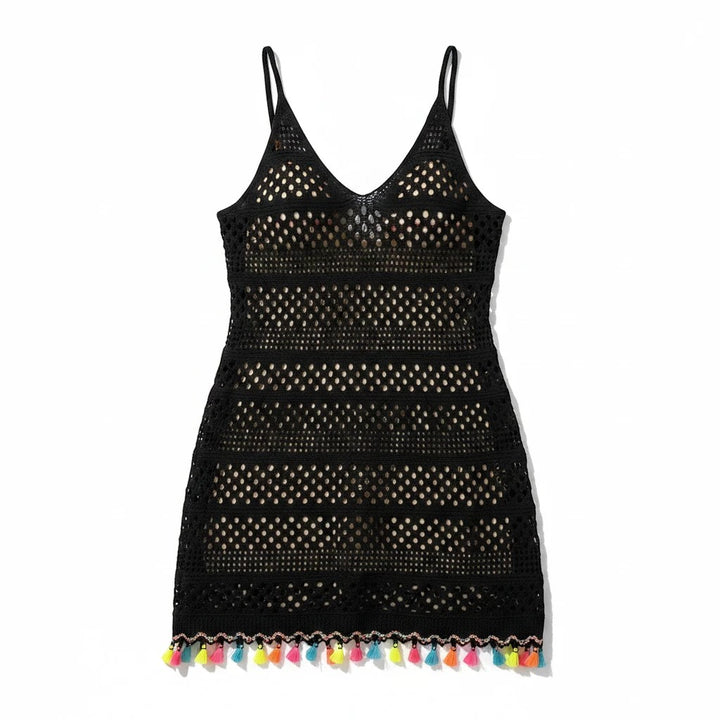 Sea Dragon Dreams black woven beach cover-up dress with hollow-out knit details and colorful tassel trim hem.