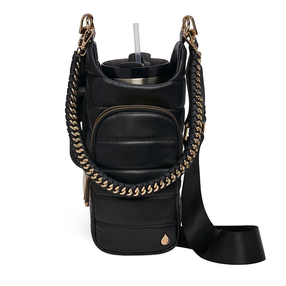 Sea Dragon Dreams HydroBag Handle in black vegan leather with gold hardware, braided chain strap, and tumbler inside.