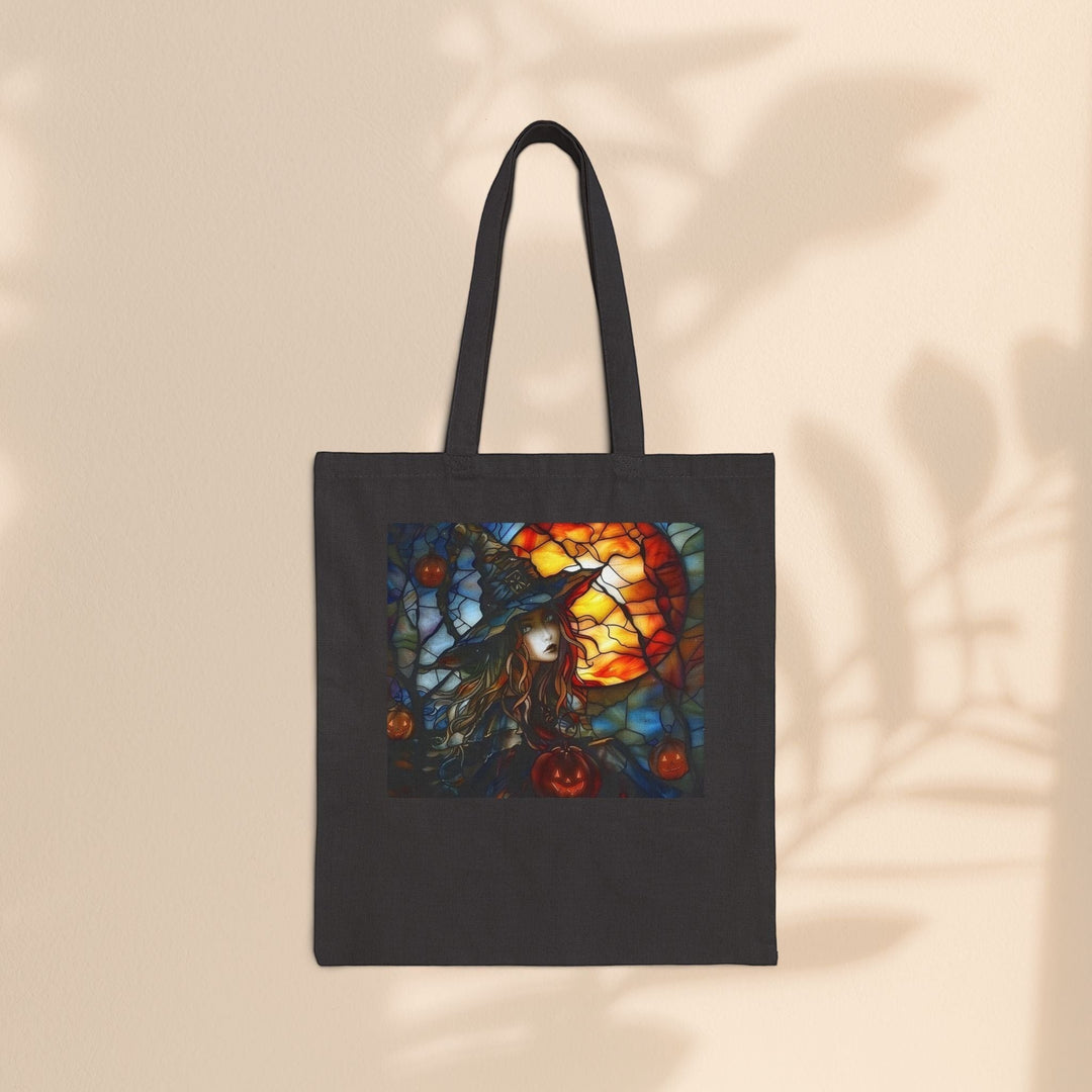 Sea Dragon Dreams black cotton canvas tote bag featuring a witchy Halloween stained glass art print.