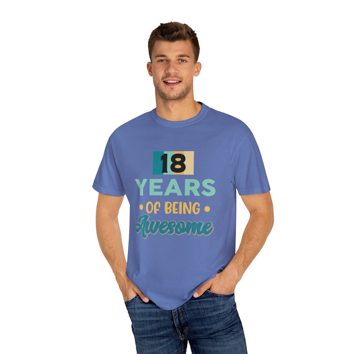 Sea Dragon Dreams unisex blue 18th birthday t-shirt with 18 Years of Being Awesome graphic on a smiling man